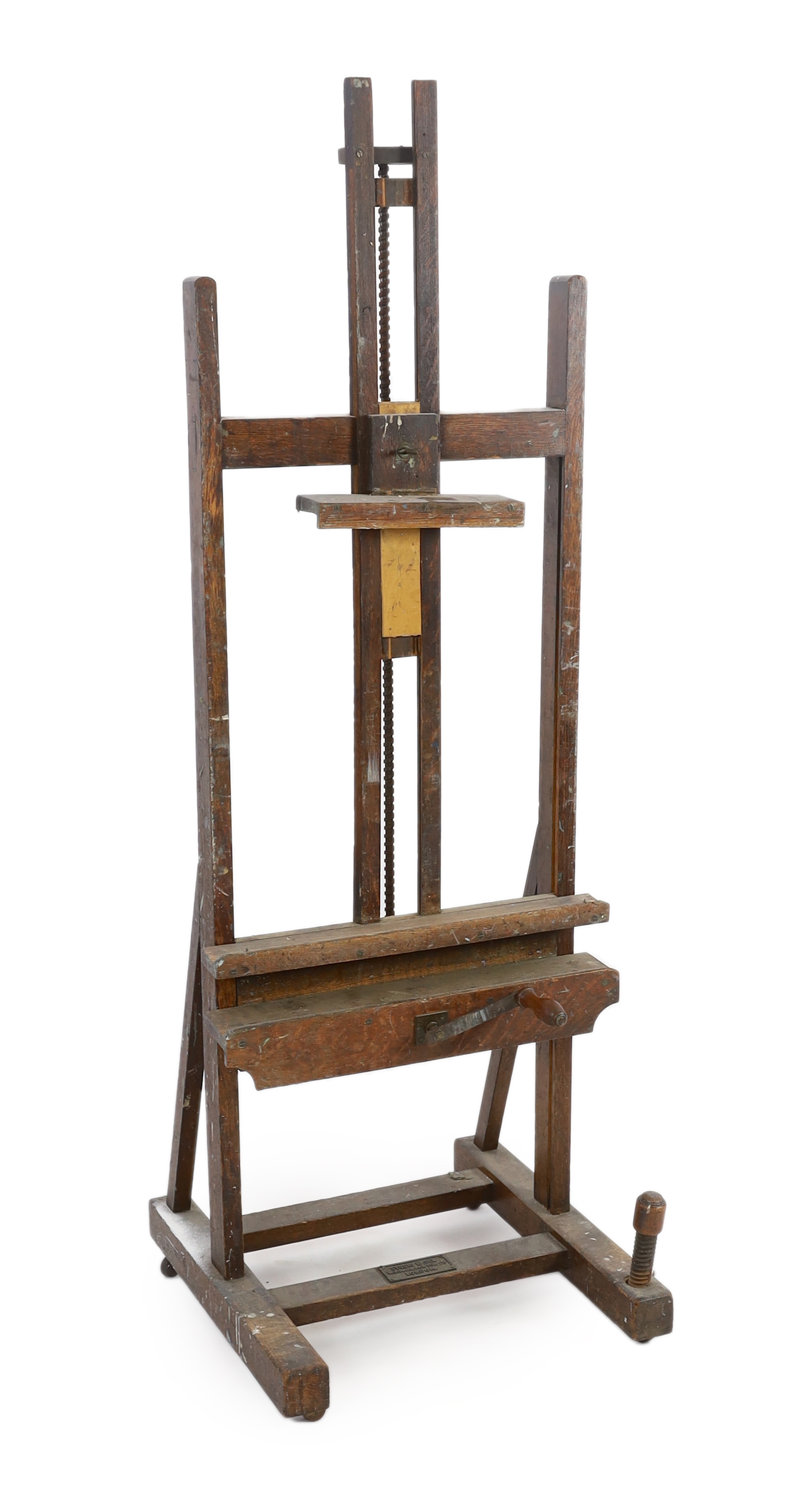 A Winsor & Newton oak studio easel, with cast brass plaque ‘Studio Easel, Winsor & Newton, Ltd, London’, 62cm wide, 64cm deep, 183cm high